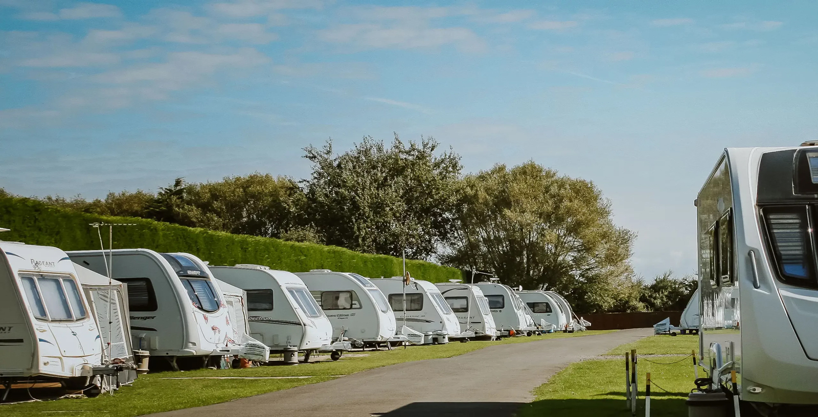 Line of caravans and motorhomes at Country View Holiday Park in Weston Super Mare