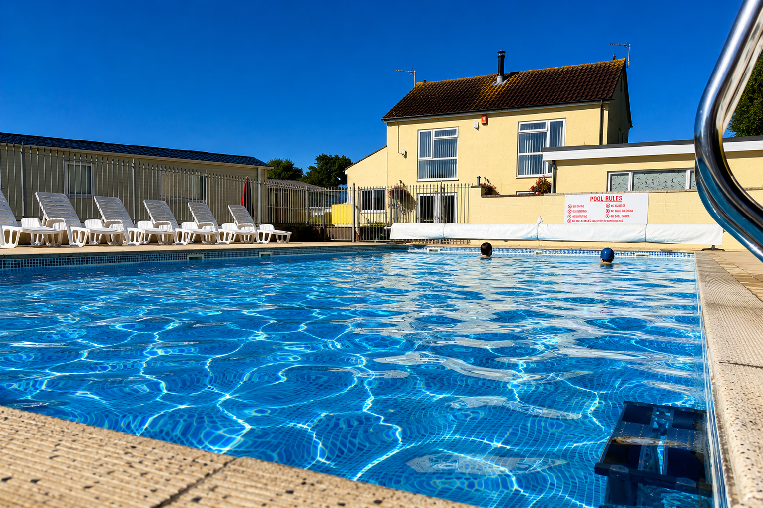Heated outdoor swimming pool at Country View Holiday Park